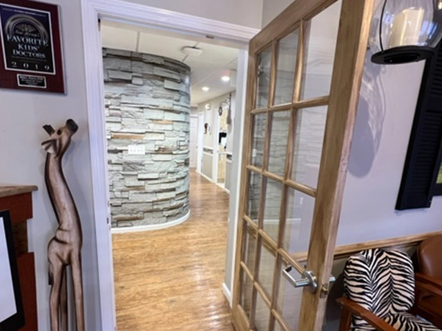Hallway inside the pediatric dental office with colorful décor