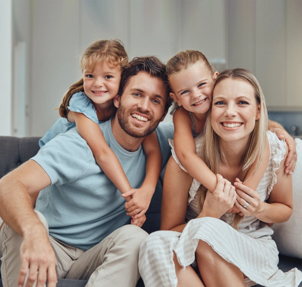 Happy family receiving dental services at Adult & Pediatric Dental Studio