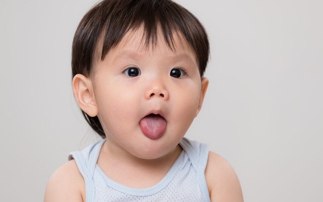 Toddler smiling during first dentist visit at a pediatric dental office in Monroe NJ