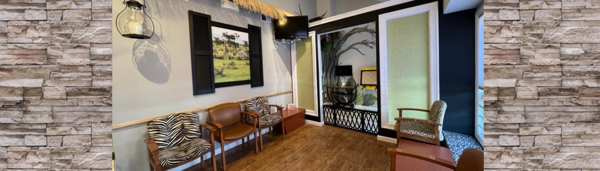 The interior view of a clean and welcoming adult dentistry waiting room with comfortable seating
