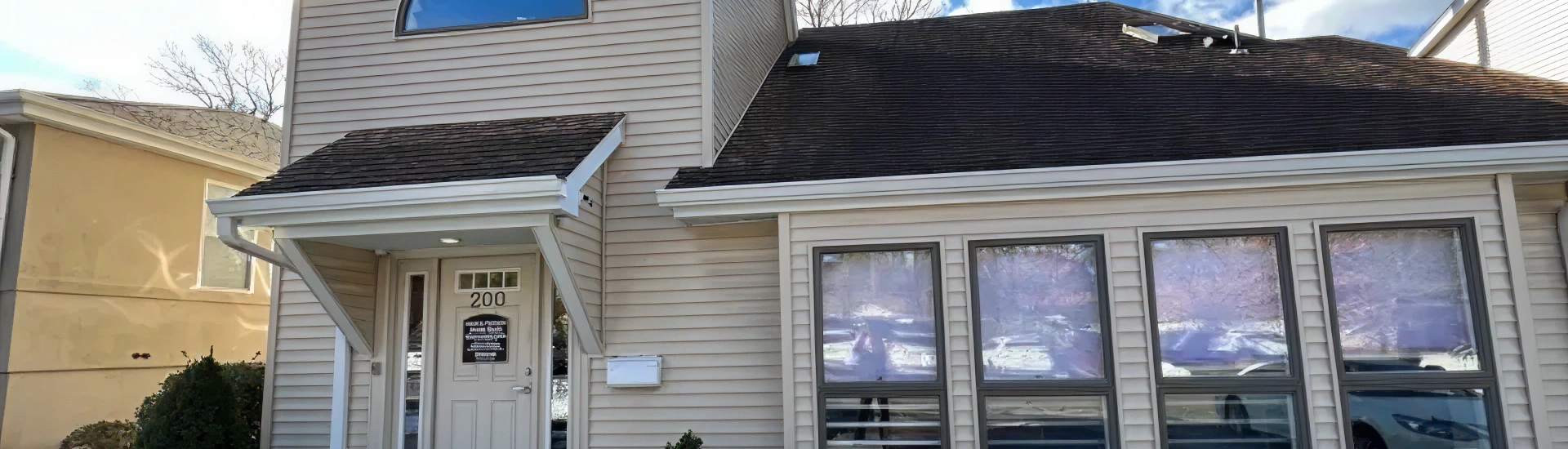 The outdoor entrance and storefront of Adult & Pediatric Dental Studio